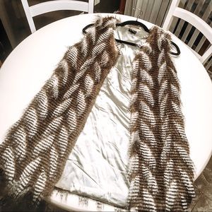 Long, satin-lined fur vest